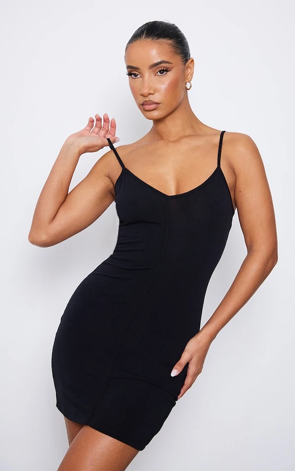 Robe Moulante En Jersey Noir à Bretelles Et Coutures 1 Robe Moulante En Jersey Noir à Bretelles Et Coutures